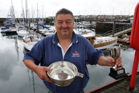 Mal Nicholson with trophies won by the Spider T at the Anstruther Muster 2011
